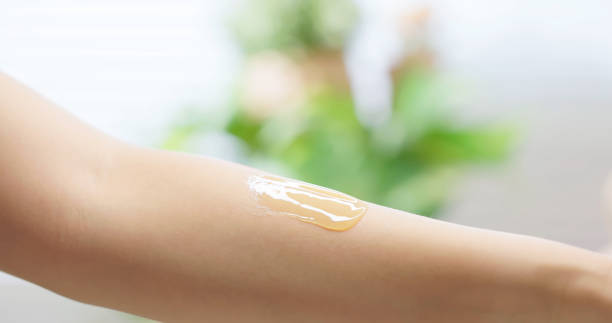 istock asian female hair removal herself 2167375211