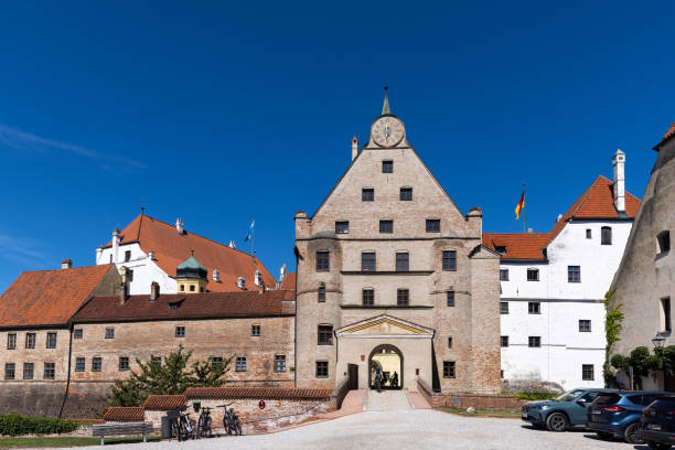 People at the Rathausplatz in the old town of Ingolstadt, a city on the banks of the River Danube in the federal state of Bavaria. On the square overlooks the old town hall, dating back to the fourteenth century.