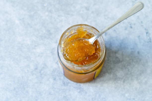 istock Homemade lemon marmalade in jar with spoon 2167376058