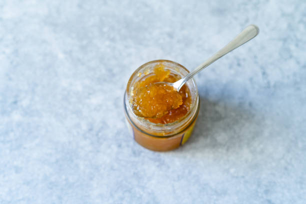 istock Homemade lemon marmalade in jar with spoon 2167376059