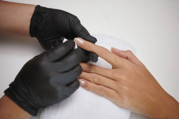 istock Administering a Manicure With Black Gloves on 2167376556