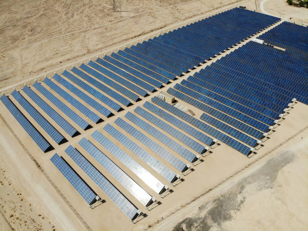 istock Solar panels power station desert aerial view 2167377675