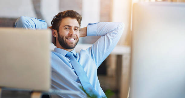 istock Businessman, relax and stretching in office with computer for reading, comfortable and satisfied with research. Professional, employee and happy or pride for project inspiration, productivity or done 2167378011