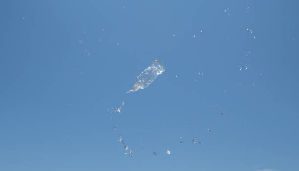 istock A plastic bottle overflowing with water in the air 2167380360