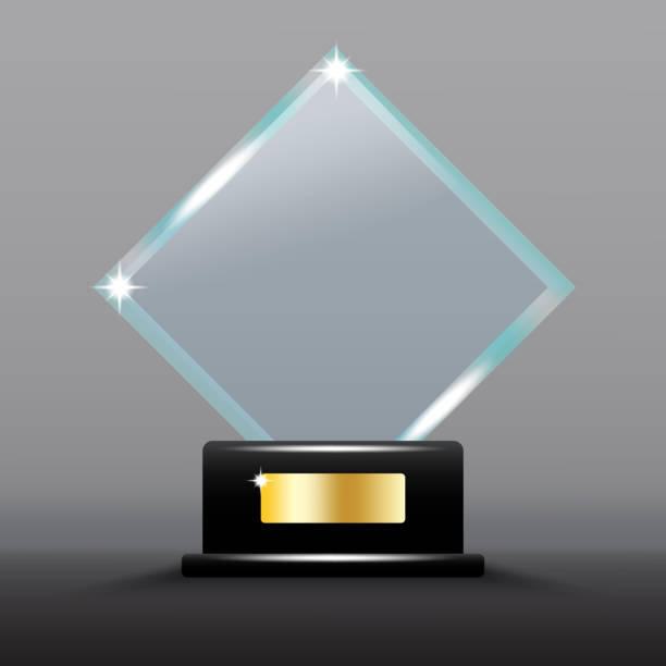 istock Glass trophy award. Black base with gold plate. Shiny diamond shape. Vector illustration. 2167380970