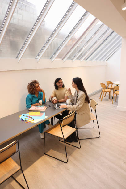 istock Creative team talking during meeting in modern office 2167381418
