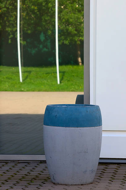 istock a trash bin near the mirrored door 2167383241
