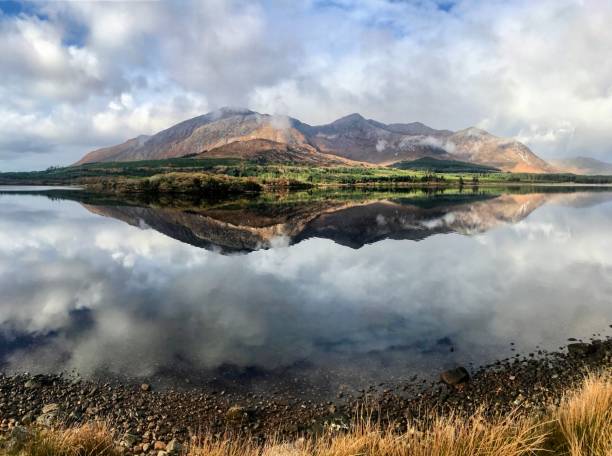 istock Mountain reflection across clear lake in Connemara, Ireland 2167383446