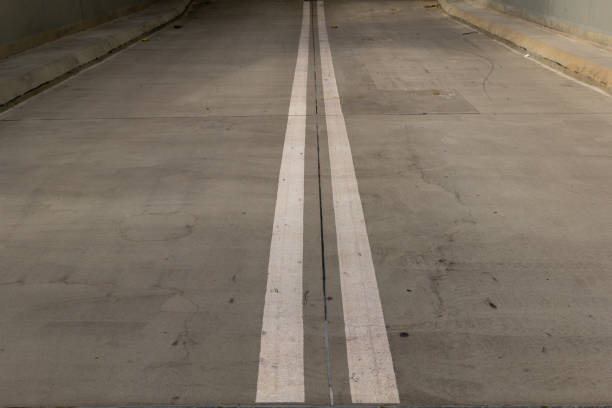 istock road with a white line down the middle 2167383506