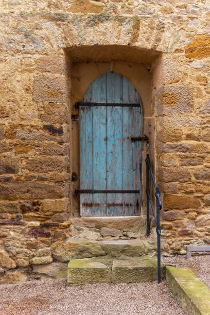istock old blue door with a wooden frame 2167383518
