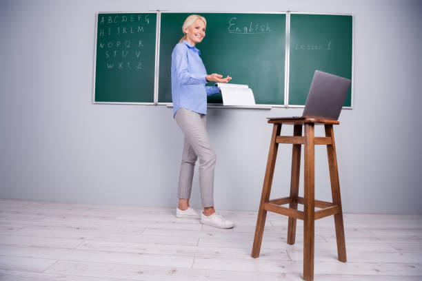 Photo of adorable qualified confident woman professor school teacher work with pupil remotely Photo of adorable qualified confident woman professor school teacher work with pupil remotely. qualified report stock pictures, royalty-free photos & images