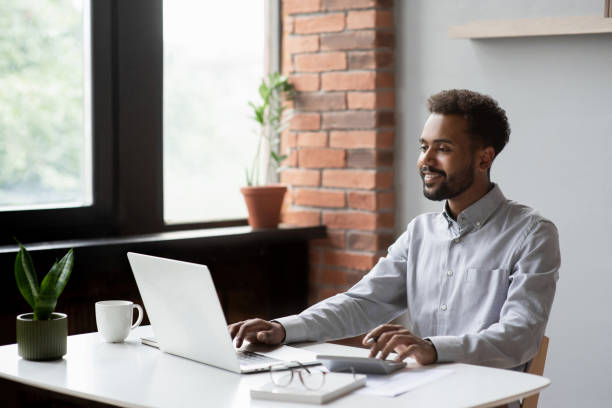 istock Man using laptop at home,, businessman working in office 2167385867
