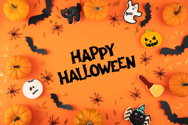 Halloween Themed Decorations on Orange Background