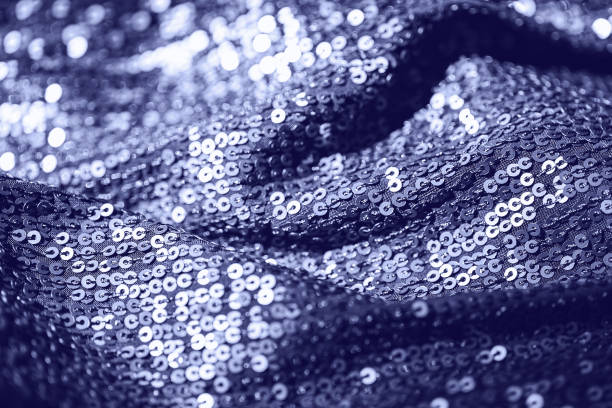 istock Abstract composition of fabric with shiny sequins. Holiday and party concept 2167390507
