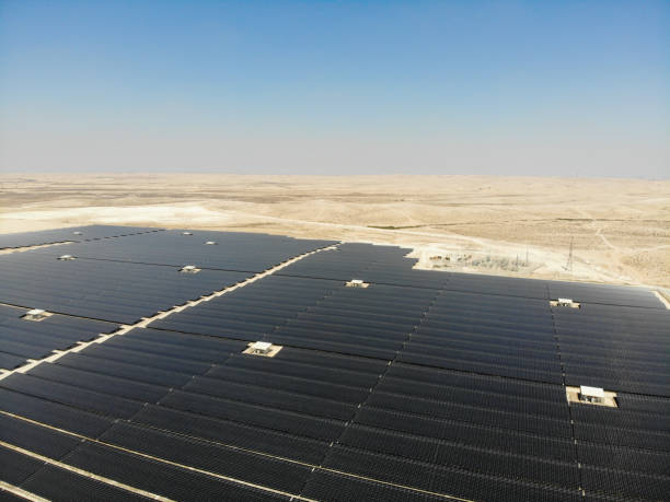 istock Solar panels power station desert aerial view 2167396920