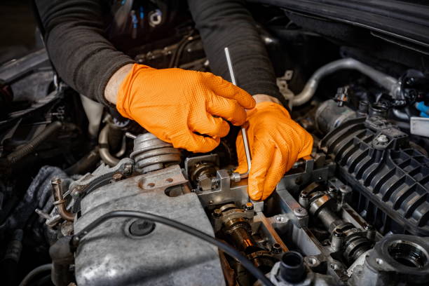 istock Mechanic Hands Fixing Car Engine in Service 2167397405
