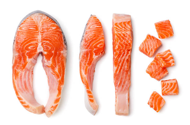 istock Salmon pieces close-up on white background. Top view 2167398067