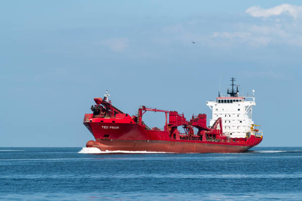 The hopper dredger Yed Prior sailing on the Wadden Sea. The Yed Prior is originally a container ship converted to a hopper dredger in 2020. Among other things, the hopper dredger is used for sand replenishment around the Wadden Islands and the deepening of navigation channels in the Wadden Sea and the North Sea.