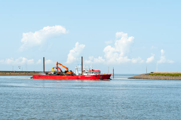 The Steeborg 1 is a former fishing vessel converted to to a ship that monitors cables of utility companies on the bottom of the Wadden Sea and secures their depth.