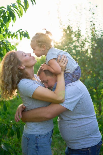 istock family playing with their toddler 2167399450