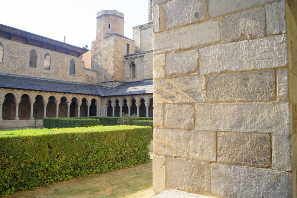 istock Stone wall in arched cloister 2167400536