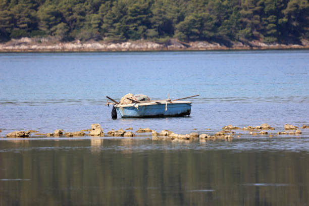 Fishing boat with nets on the lake.