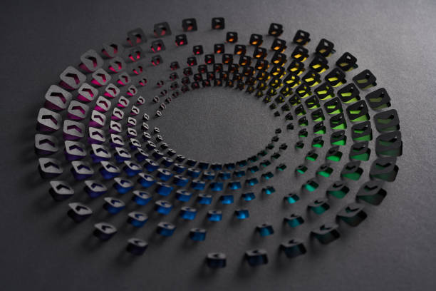 Intricate circular pattern of multicolored paper arrow icons arranged in concentric circles on a dark background.