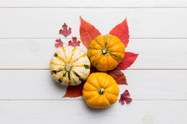 istock Autumn composition. Pattern made of dried leaves and other design accessories on table. Flat lay, top view 2167403849
