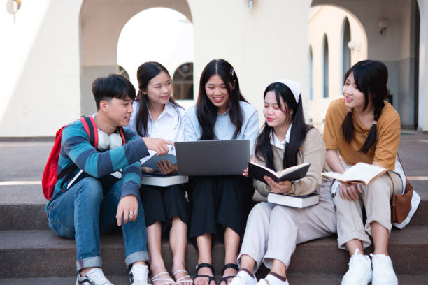 istock Group of students studying on campus outdoors 2167412713