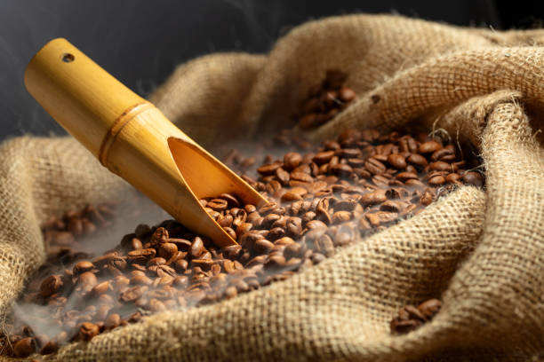 istock Fresh roasted coffee beans in burlap bag. 2167415739