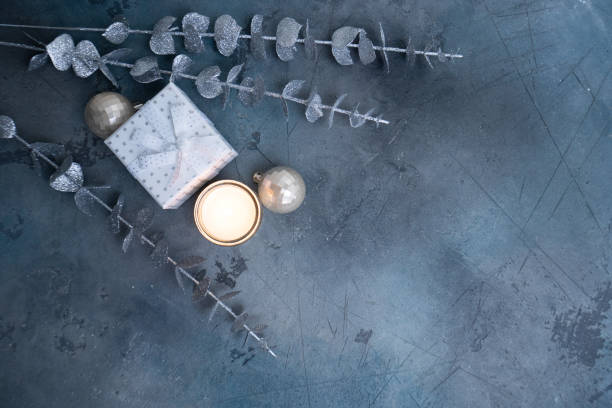 Discover elegant Christmas decor featuring candles and beautiful decorative elements for a truly festive ambiance