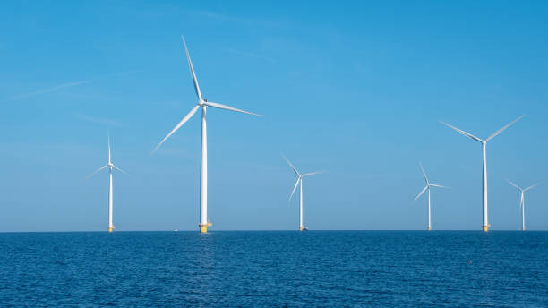 istock Majestic Windmill Park Overlooking Tranquil Waters in the Netherlands at Sunset 2167424205