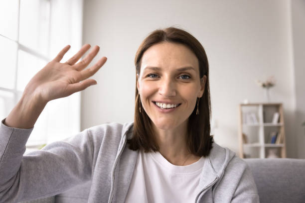 istock Cheerful woman makes video call use modern app 2167424620