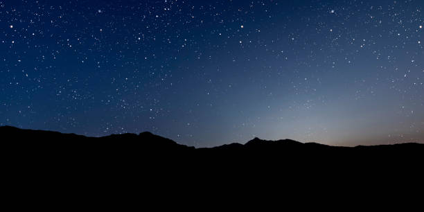 istock a Night sky panorama with stars and moon 2167429248