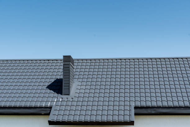 istock Composite material roof with chimney against blue urban sky 2167432495