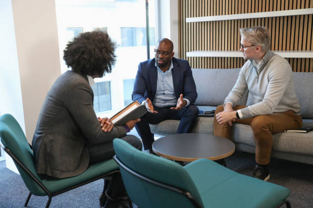 istock Businessmen talking in office 2167433614