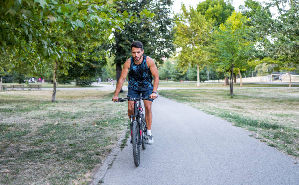 Free Stock Photo of Cyclist in red boots riding a bicycle with a rear ...