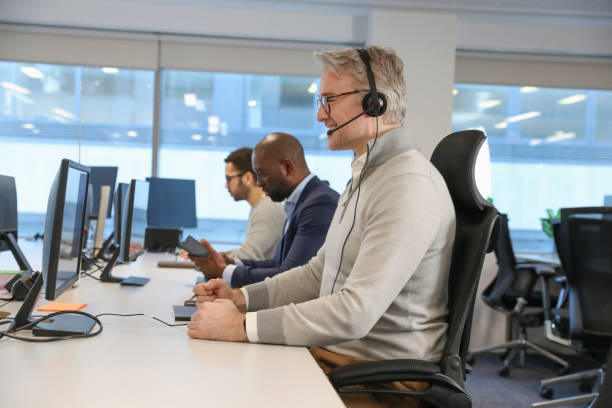 istock Businessman with headset in office 2167433829