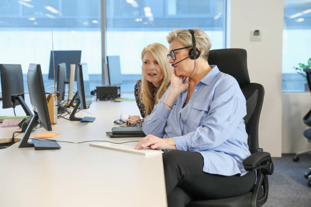 istock Businesswomen working in office 2167434315