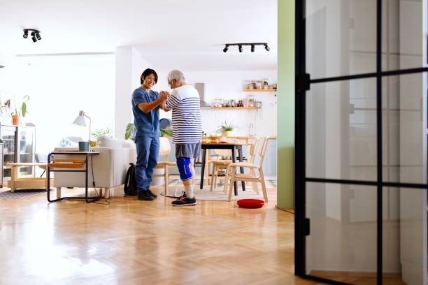 istock Caring physical therapist congratulating a senior man with his recovery 2167438509