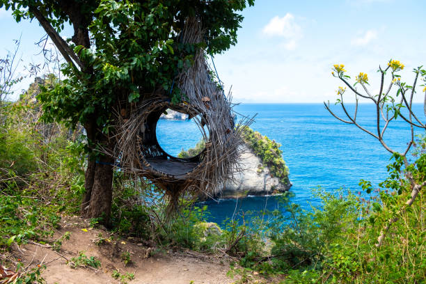 istock Couple Enjoying Scenic Ocean View from Cliff Path 2167438649