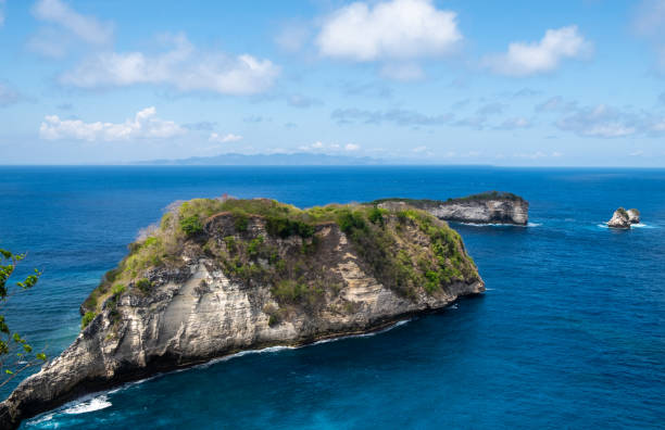 istock Island Cliff Overlooking Blue Ocean 2167438651