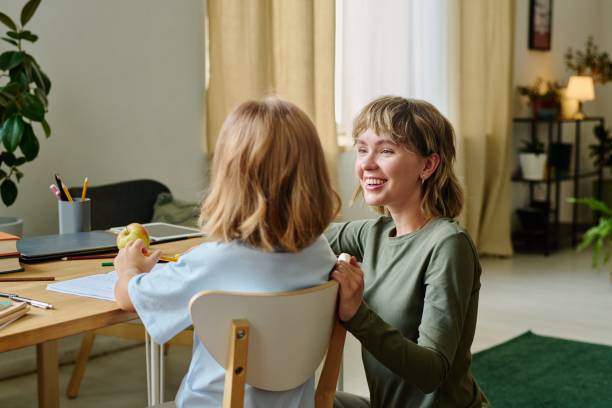 istock Mother Smiling to Her Daughter 2167441939