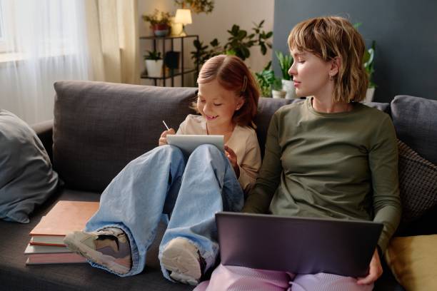 istock Mother Looking at Kids Sketch 2167444228