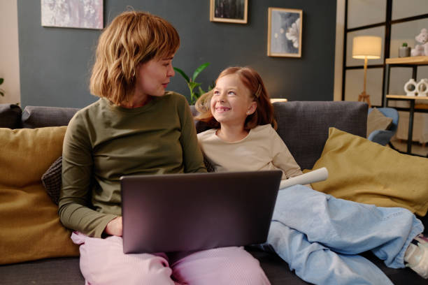 istock Parent and Kid Laughing Together 2167444553