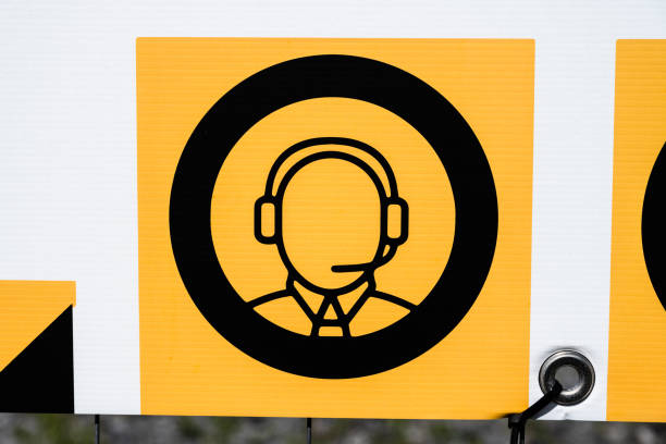 Sign showing a person with a head set.