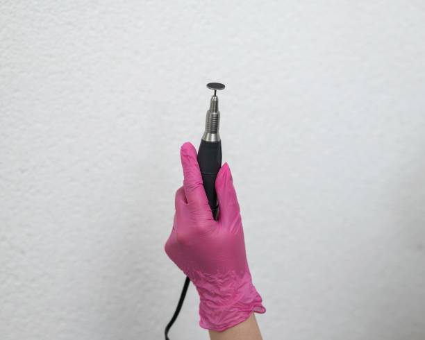 istock Machines with an abrasive disc for professional pedicure. Copy space. 2167448696