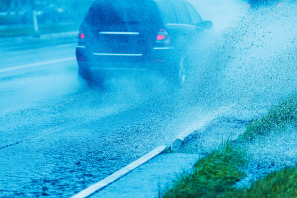 istock Cars on wet asphalt. It's raining outside. 2167449637