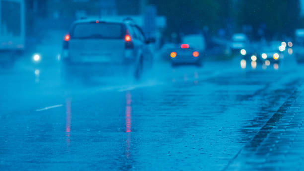 istock Cars on wet asphalt. It's raining outside. 2167450416