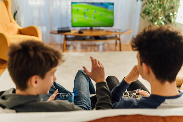 istock Friends playing video games 2167450744